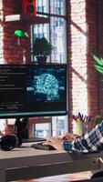 Admin using computer in home office for artificial intelligence computing simulating human brain through self learning algorithms. Employee working with AI deep neural networks on desktop PC, camera A video