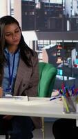 Vertical Diverse team of women collaborate in a problem solving meeting, promoting gender equality and social development in business industry. Managers demonstrating teamwork and progression. Camera A. video