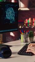 Freelancing computer engineer doing maintenance on artificial intelligence systems, closeup. Remote tech support specialist at working from home, doing checkup on AI systems, camera A video