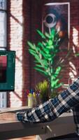 Remote employee in home office using AI software turning text prompt into photos. Person in apartment using text to image artificial intelligence generator transforming words into pictures, camera A video
