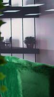 Vertical Empty office workspace showcases monitor with research analysis during meetings, running infographics in a high end conference room. Used by corporation staff to develop strategies. video
