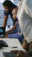 Vertical Engineer arriving in data center, saluting colleagues, starting maintaining company network infrastructure. Woman entering server hub, starting job shift, ensuring optimal system performance, camera A video