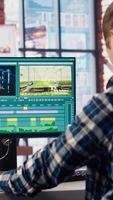 editor analyzing film montage on computer screen before editing color grading and lighting in creative home office. Post production studio employee working with raw footage on PC, camera B video