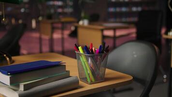 Empty academic setting combines historical charm with elegant study desks, serene lighting and a formal workspace. Vintage space offering a peaceful and inspiring atmosphere for research. video