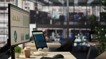 Empty high end office workspace with advanced technology to enhance efficiency, helping business professionals focus on financial strategies. Global enterprise success objectives. video