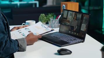Employee working from home doing business meeting videocall with manager requesting to see financial charts. Teleworker in remote teleconference call with team leader showing task progress, camera A video