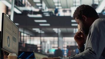 Black corporate team collaborate on global investment strategy, employing their extensive business expertise to work on data driven decisions. Solving administrative tasks for efficiency. Camera A. video