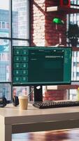 AI LLM chatbot software interface on PC in home office showing virtual assistant answering user prompts. Large language model program on monitor communicating with user through artificial intelligence video
