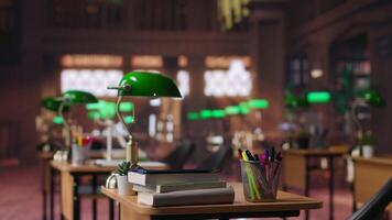 Historic library showcases elegant interior design with bookshelves, creating a quiet atmosphere with traditional desks. Empty sophisticated study area for scholarly and academic pursuits. video