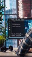 Developer writing code on computer and doing maintenance on artificial intelligence neural networks computerized model. Tech support expert typing on keyboard, doing checkup on AI systems, camera A video