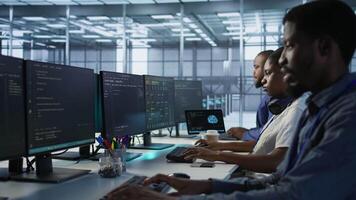 Admin in data center drinking coffee and implementing AI predictive maintenance systems. Server hub worker enjoying hot beverage, using artificial intelligence to identify hardware failures, camera A video
