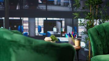 Empty office space showcases a monitor with financial data during meetings, running detailed infographics in a high end decorated workspace. Develop business strategies for success. video