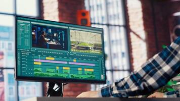 editor analyzing film montage, editing color grading and lighting in creative home office, zoom in shot. Post production studio employee working with raw footage to improve quality, camera B video