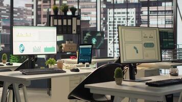 Empty corporate workspace equipped with advanced tools to serve an enterprise activity, office in a modern city center corporation. Global organization with luxurious workstations and modern gadgets. video