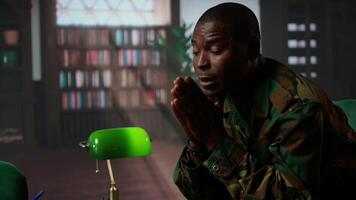 Therapist offering help to army soldier during psychotherapy session, suffering from bipolar disorder and shell shock due to war flashbacks. Distraught military personnel deals with PTSD. Camera A. video