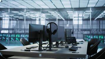 Close up of tablet in data center workspace used for controlling company network infrastructure. Focus on coding software on device in server room used to ensure optimal system performance video
