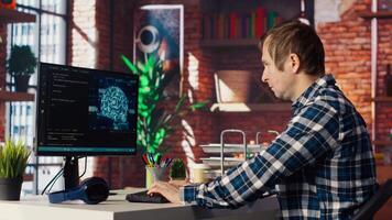 Teleworking programmer using computer for artificial intelligence computing through self learning algorithms. Remote worker working with AI deep neural networks on desktop PC, camera B video