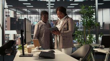 Businesspeople colleagues strategize a plan at a modern workplace, focusing on company goals by developing a sustainable enterprise strategy to achieve corporate success and objectives. Camera B. video