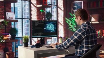Admin using computer in home office for artificial intelligence computing simulating human brain through self learning algorithms. Employee working with AI deep neural networks on desktop PC, camera A video