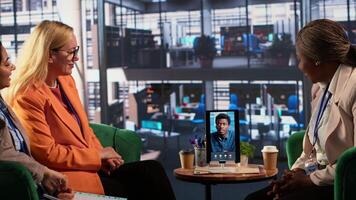 Goals oriented women hold online business meeting via call, discussing business strategy with the CEO to ensure global expansion project. Equal rights for female leaders in a firm. Camera A. video