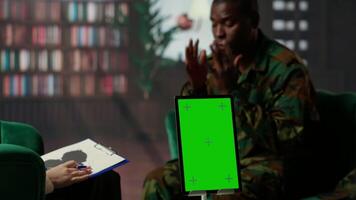 Counseling session for a army war soldier with isolated copy space display, showcasing therapy support for PTSD and reintegration into society. Armed forces soldier with flashbacks. Camera B. video