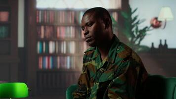 African american soldier remembering war flashbacks and dealing with a serious case of shell shock syndrome, traumatic memories. Armed forces veteran feels guilty with PTSD. Camera B. video
