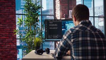 Developer writing code on computer and doing maintenance on artificial intelligence neural networks computerized model. Tech support expert typing on keyboard, doing checkup on AI systems, camera A video
