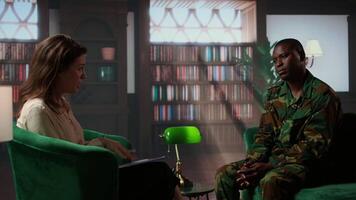 African american soldier remembering war flashbacks and dealing with a serious case of shell shock syndrome, traumatic memories. Armed forces veteran feels guilty with PTSD. Camera A. video