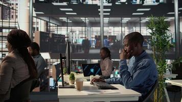 Male enterprise worker conducting financial planning and goal setting, demonstrating expertise in budget management. Expert analyzing online reports and forecasts to drive growth plans. Camera B. video