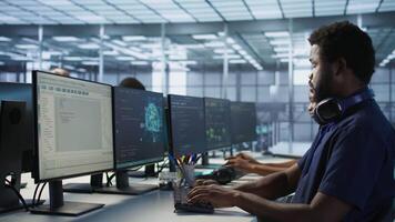 Manager assisting data center engineer in solving tasks, maintaining company network infrastructure. Team leader in server farm helping worker ensuring optimal system performance video
