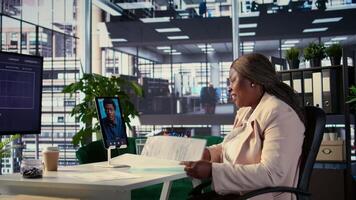 Black female leader negotiating with partner on online videocall, asking for financial support to sustain an expansion project. Female entrepreneur driven for success, management skills. Camera B. video