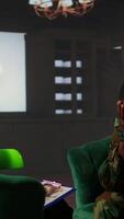 Vertical Distraught soldier in tears sharing his struggles with war PTSD, attends therapy session with expert for rehabilitation. Psychological support and society reintegration for veterans. Camera A. video