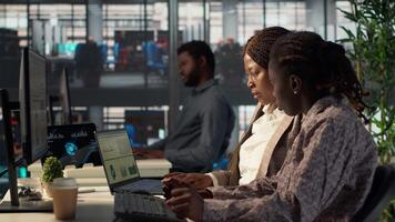 Black business staff strategizing a plan for growth in modern office, focusing on company goals by developing a sustainable enterprise strategy to achieve corporate success and objectives. Camera A. video