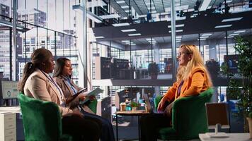 Skilled enterprise leader in a meeting strategizing with stakeholders to discuss ideas for company development. Ambitious diverse women in a men dominated business environment. Camera B. video