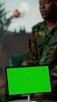 Vertical Military soldier experiences shell shock at counseling next to copy space, dealing with trauma recovery and share his feelings. Army trooper with PTSD and combat flashbacks scenes. Camera B. video