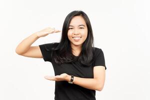 Measuring and Showing Big Sign Product of Beautiful Asian Woman Isolated On White Background photo