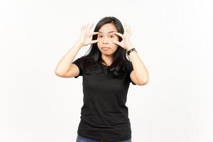 Trying open the eyes of Beautiful Asian Woman Isolated On White Background photo