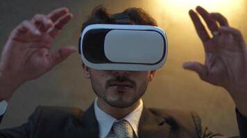 Businessman in a formal suit experiencing virtual reality with a VR headset. Modern technology meets professional innovation, exploring immersive solutions for business and communication. video