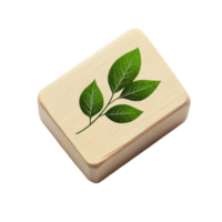 A wooden block with a green leaf on it png