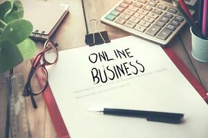 online business text on notepad photo