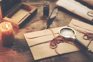 letters and ink on table photo