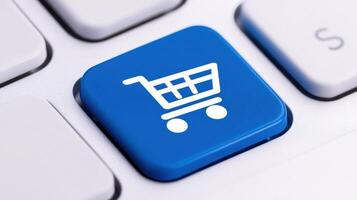 Blue button with a shopping cart icon on a white keyboard, representing an online store or e-commerce concept photo