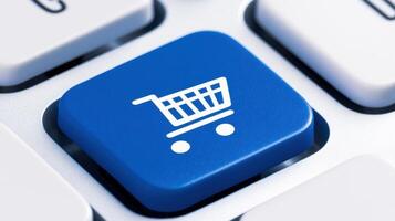 Blue button with a shopping cart icon on a white keyboard, representing an online store or e-commerce concept photo