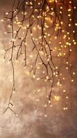 Golden leaves christmas lights garland shines against a golden backdrop with bokeh effect a snowy holiday illumination photo