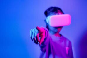 Girl wearing virtual reality goggles, Future technology concept, finger touching the screen photo