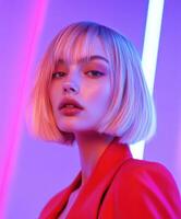 Elegant model poses with colorful lighting in modern styling shoot photo