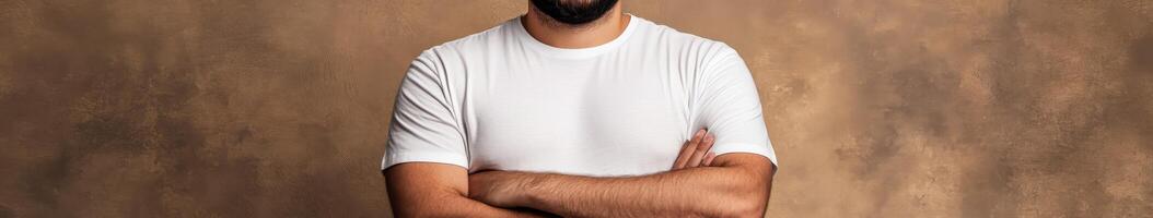 Man with crossed arms poses confidently against a textured background photo