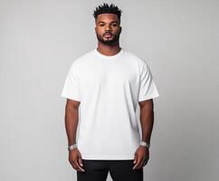 Casual portrait of a man in a plain white t-shirt against a neutral background photo