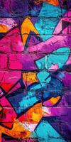 Vibrant urban mural with abstract shapes and colors on brick wall photo