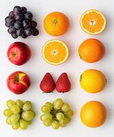 Colorful arrangement of fresh fruits on a white background photo
